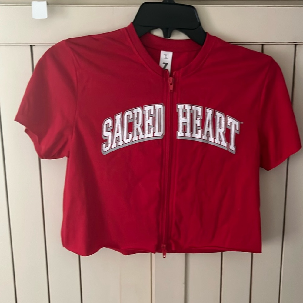 Barely worn Sacred Heart zippered crop top. Bought at bookstore